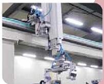 Core unloading unit with overhead gripper