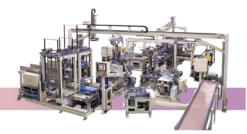 AUTO CORE BUILDER (HEATER) line with unloading conveyor